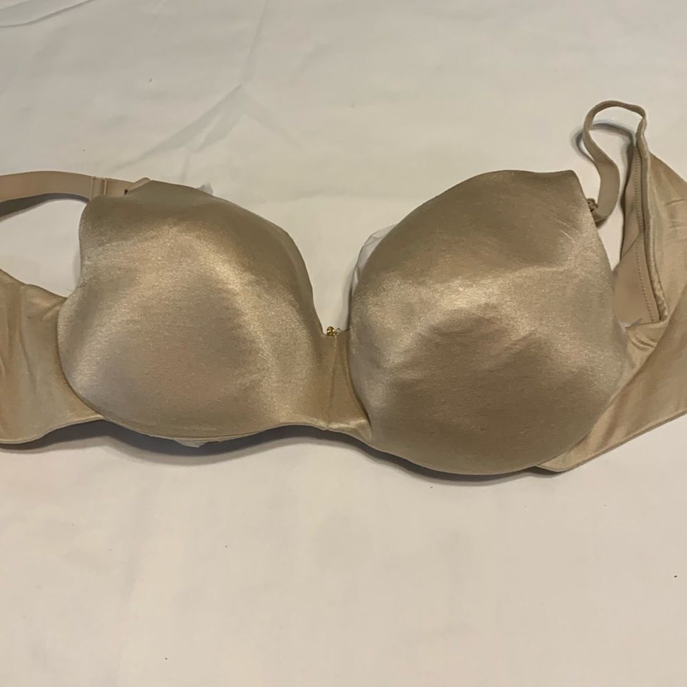 CACIQUE Size 38F underwire and lightly padded seamless bra.  Color nude